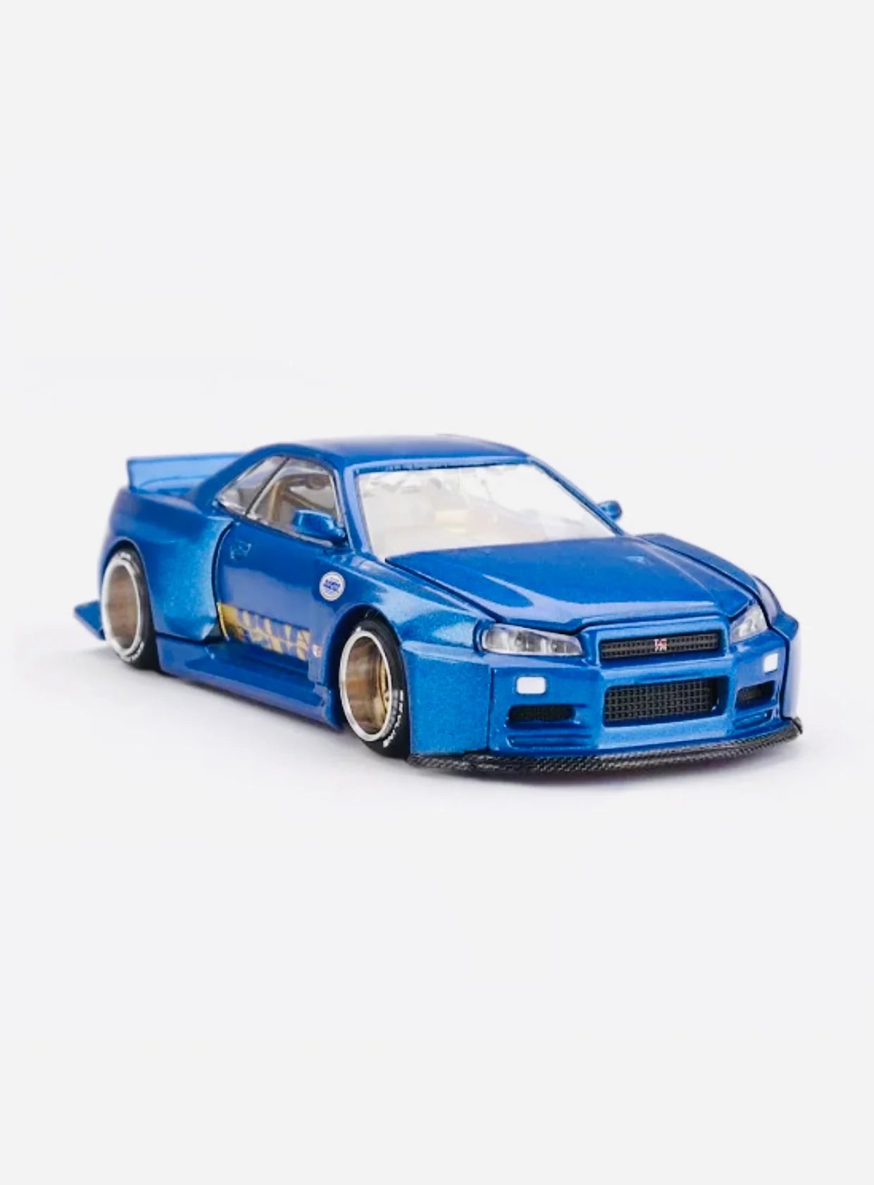 Kaido House - Mini GT: Nissan Skyline GT-R (R34) Kaido Works (V2 Aero) SHINJUKU V2 blau (KHMG158) | 1:64