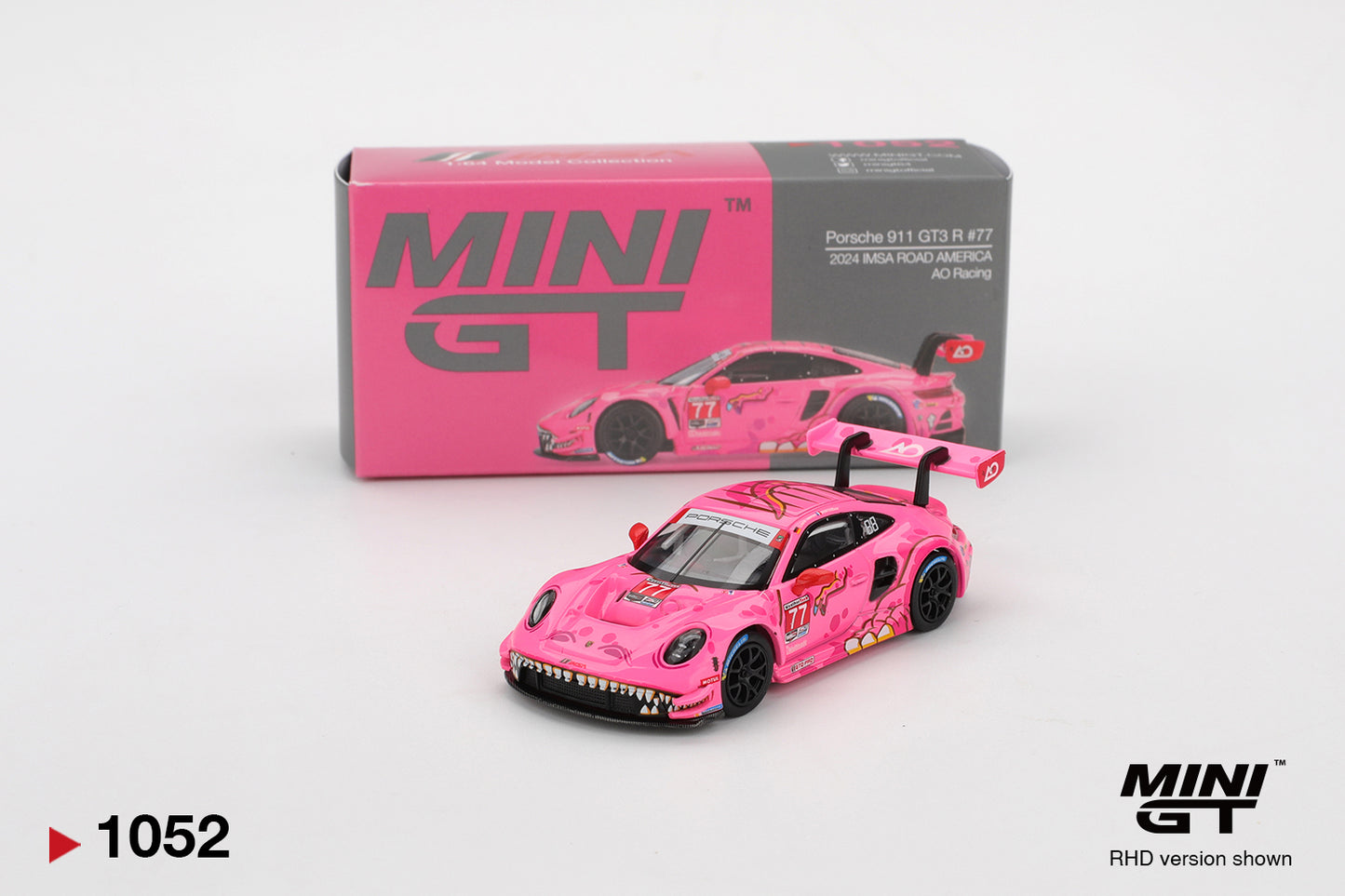 Mini GT #1052 - Porsche 911 (992) GT3 R ROXY #77 AO Racing Road America, pink | 1:64