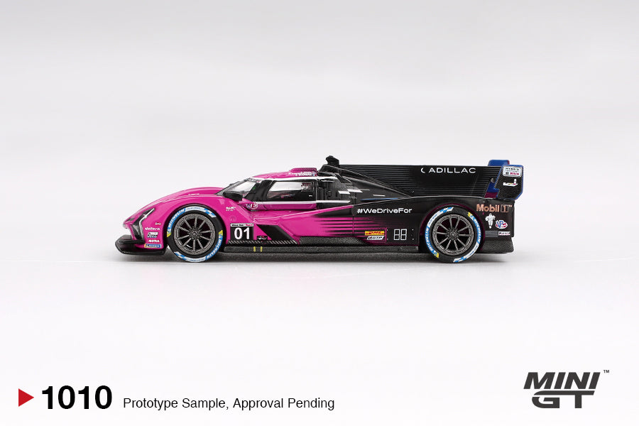Mini GT #1010 - Cadillac V-Series.R #01 Cadillac Racing Petit Le Mans, pink/black | 1:64
