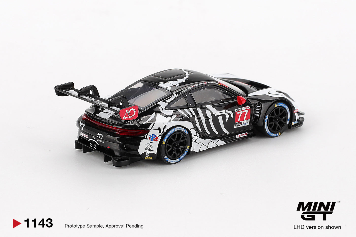 Mini GT #1143 - Porsche 911 GT3 R #77 AO Racing 2025 IMSA Petit Le Mans, white/black/red | 1:64